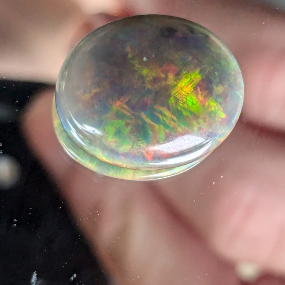 5.85ct Natural play of color black opal - Picture 12 of 16
